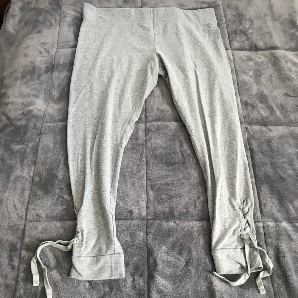 LIKE NEW! Gray leggings with tie up legs.